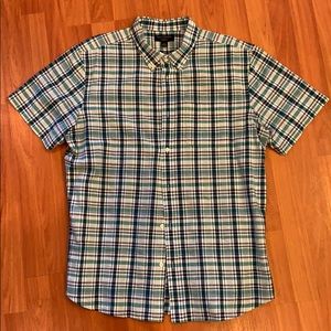 Short sleeve pocket button shirt. Never warn